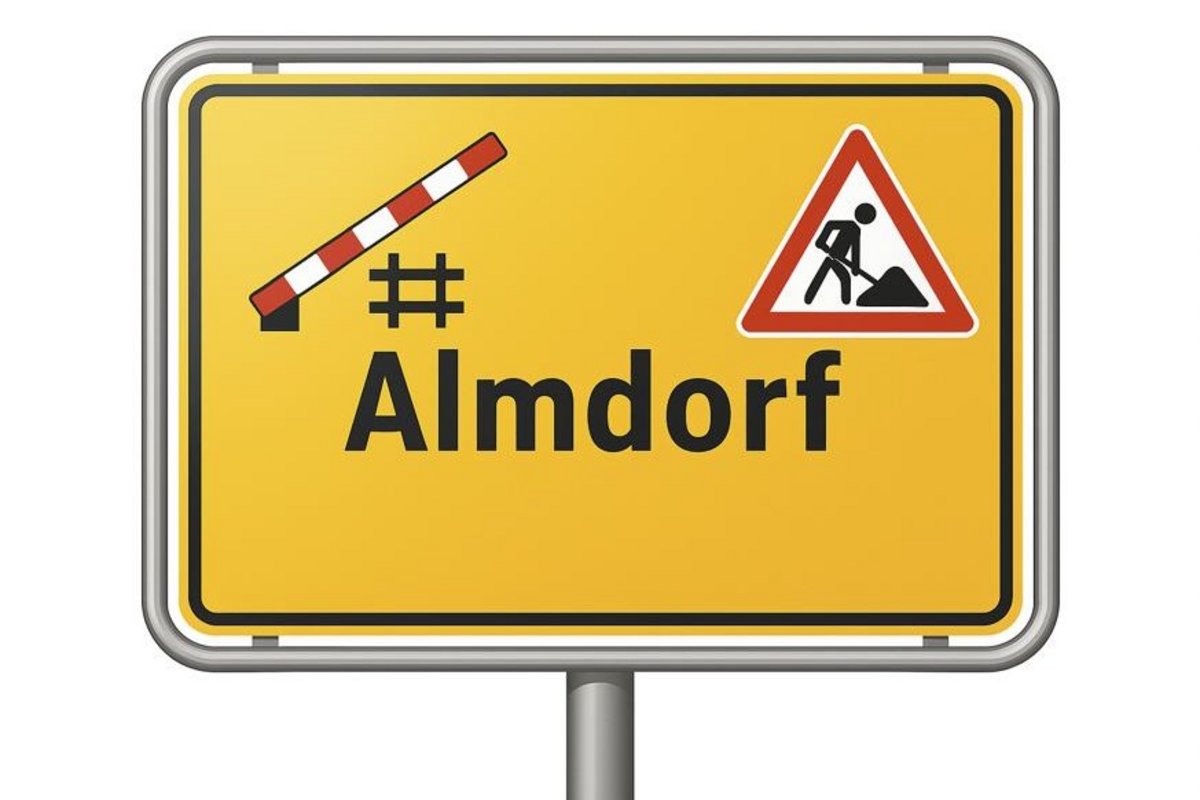 Ab dem 22. Januar ist der Bahnübergang von der B5 in Richtung Almdorf gesperrt. Grafik: AMNF/KI generiert Das Ortsschild von Almdorf mit Baustellensymbolen